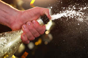 Popping Champagne Bottle [wallpaper] Wallpaper