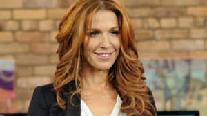 Poppy Montgomery Smiling Portrait Wallpaper