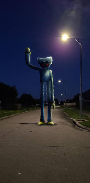 Poppy Playtime’s Giant Huggy Wuggy Wallpaper