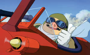 Porco Rosso Flying High In His Red Seaplane Wallpaper
