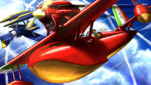 Porco Rosso Soaring Through The Skies In His Iconic Red Plane Wallpaper