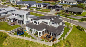 Porirua Suburban Luxury Home Aerial View Wallpaper