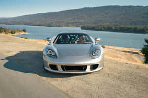 Porsche Carrera Gt In Full Speed Wallpaper