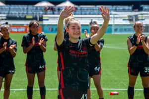 Portland Thorns F C Player Celebration Wallpaper