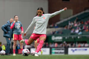 Portland Thorns F C Player Controlling Ball During Match Wallpaper