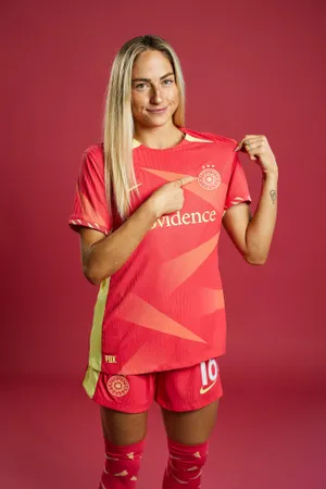 Portland Thorns F C Player Presenting Jersey Wallpaper