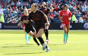 Portland Thorns F C Playersin Action Wallpaper