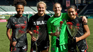 Portland Thorns F C Playerswith Roses Wallpaper