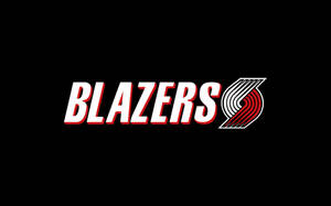 Portland Trail Blazers Logo On A Black Backdrop Wallpaper