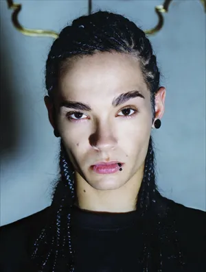 Portraitof Personwith Braided Hairand Piercings Wallpaper