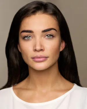 Portraitof Young Womanwith Dark Hair Wallpaper