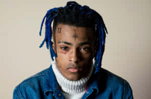 Posthumous Xxxtentacion With Blue Dreads Wallpaper
