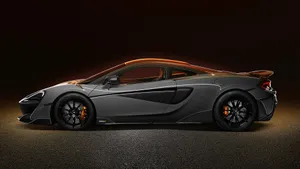 Power Meets Elegance – The Mclaren 600lt In Action Wallpaper