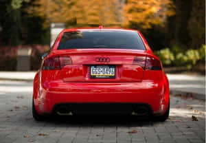 Powerful Audi Rs4 Accelerating On The Road Wallpaper