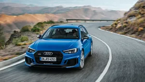 Powerful Audi Rs4 In Action Wallpaper