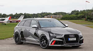 Powerful Audi Rs6 In Action Wallpaper