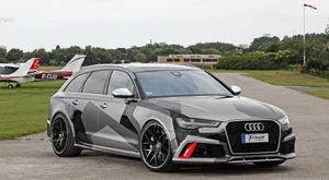 Powerful Audi Rs6 In Action Wallpaper