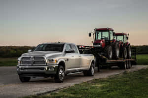 Powerful Dodge Ram 1500 Charging Through Wilderness Wallpaper