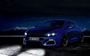 Powerful Elegance - Volkswagen Scirocco In Motion Wallpaper