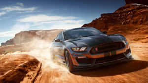 Powerful Ford Mustang Shelby Gt350 In Action Wallpaper