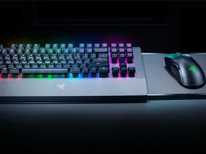 Powerful Gaming Mouse Showcased On A Futuristic Background Wallpaper