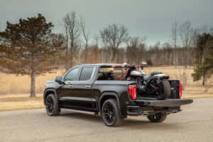 Powerful Gmc Sierra Pickup Truck In Stunning Natural Setting Wallpaper