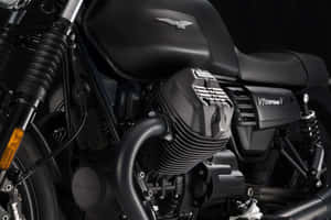 Powerful Moto Guzzi Motorbike On The Move Wallpaper