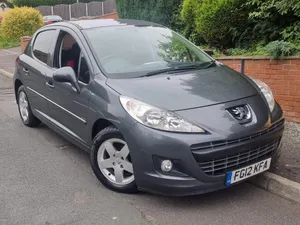 Powerful Peugeot 207 In Motion Wallpaper