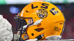 Powerful Protection - Close-up Shot Of A Football Helmet Wallpaper