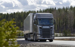 Powerful Scania S520 Hauling On The Highway Wallpaper