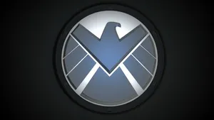 Powerful Shield On Dark Background Wallpaper