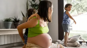 Pregnant Belly Mother Playing With Kids Wallpaper