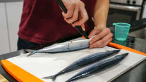 Preparing Pacific Saury Fish Wallpaper