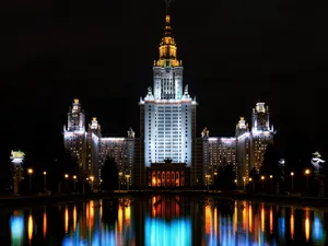 Prestigious Moscow State University Under The Clear Blue Sky Wallpaper