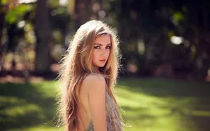 Pretty And Long-haired Single Woman Wallpaper