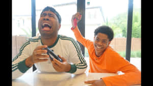 Prettyboyfredo Taking A Break For A Game Of Basketball Wallpaper