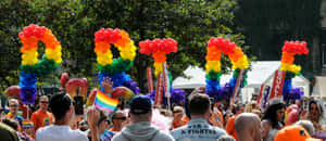 Pride Parade Celebration Balloon Arch Wallpaper