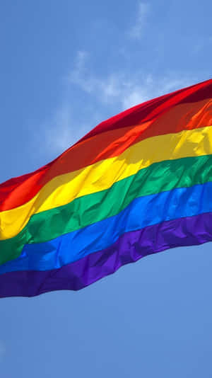 Pride Unfurled - The Vibrant Lgbt Flag Wallpaper