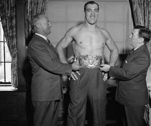 Primo Carnera With Jimmy Kohnston And John Reed Kilpatrick Wallpaper