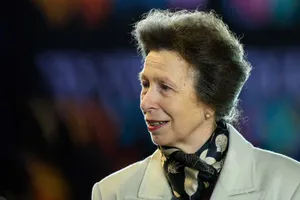 Princess Anne Wearing Beige Jacket With Scarf Wallpaper