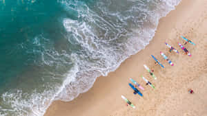 Pristine Australia Beach With Crystal Clear Blue Waters And Golden Sand Wallpaper