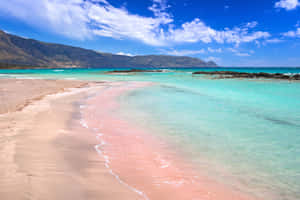 Pristine Greek Beach With Crystal Clear Waters Wallpaper