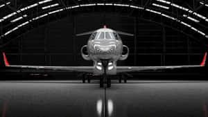 Private Jet In Hangar Wallpaper