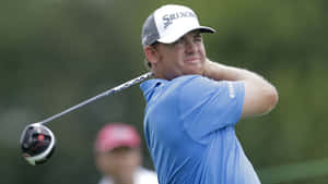 Pro Golfer Jb Holmes In Blue Wallpaper