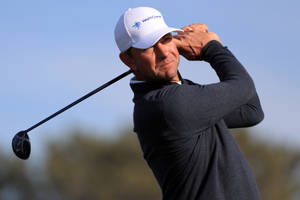 Pro Golfer Lucas Glover Deep In Concentration Wallpaper