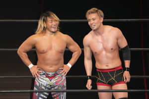 Pro Wrestlers Smilingin Ring Wallpaper