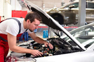Professional Car Repair Service In Action Wallpaper