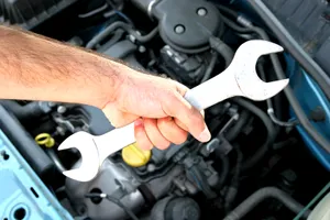 Professional Car Repair Service In Progress Wallpaper