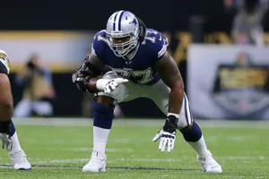 Professional Football Player Ready Position Wallpaper