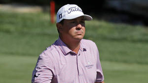 Professional Golfer Jason Dufner Focusing Intensely During A Match Wallpaper